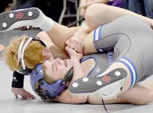 Sam Titus places fourth in 144 lb. weight class at the Twin Loup Invitational. Titus wrestled in six matches and four matches. Wrestling Photos by Devin Painter