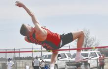 Freshman Jacob Ortner competes in the high jump.