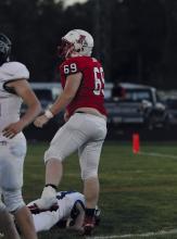 Sophomore John Lewis celebrates after sacking North Central’s Landon Stephen.