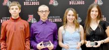 Cross Country awards were presented to (left to right) Holden Beel - Most Valuable Runner, Ty Bolli - Team Player Award, Tessa Barthel - Team Player Award and Katherine Kerrigan - Most Outstanding Performer.