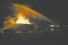 The Ainsworth and Long Pine Fire Departments as well as the Brown County Ambulance Association responded to a garage that had caught on fire just after 8 p.m. on Thursday, March 26, belonging to Angela and Robert Clark. The garage had caught fire, which transferred to a camper parked near the garage. The garage and camper were a total loss.