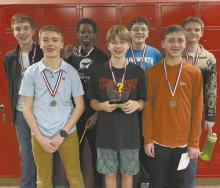 The Ainsworth Middle School Quiz Bowl team earned the runnerup trophy at the Quiz Bowl hosted by ESU 17 on Tuesday, March 3rd. The team went 4-0 in their preliminary matches, then lost to Chambers in the championship match. Team members are: back row (left - right) Buck Ruhter, Keith Munnu, Leighton Konkoleski, Onyx Morse. Front row: Blake Hansmeyer, Paul Denny, and Max Hasenohr.