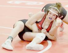Paisley Hoffman took first place in the 105 lb. weight class by pinning all three of her opponents.