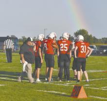 Much of Friday afternoon was raining in the Ainsworth area. Just before the game started, the rain cleared off, leaving a rainbow over the field for most of the first half.