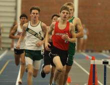 Holden Beel runs in the 1600 meter race during the meet. Beel placed sixth.