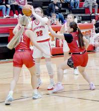 Double teamed most of the night, Gracyn Painter puts up a shot against the Ord Lady Chants in the Lady Bulldogs first game of the 2024-25 season.