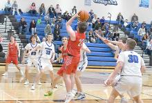 Junior Witten Painter pulls up for a jump shot. Painter had 16 points on the night, 12 of which were three-pointers.