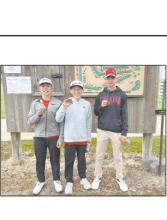 Medalists at the North Central Invite were (left to right): Nathan Fernau (first), Callen Pierce (seventh), and Drew Palmer (eighth).