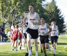 Senior Dawg Kaden Seidel leads a group of Bulldogs including Cesar Mingo-Guichard and Jon Strand. Photo Courtesy of Prep Running Nerd