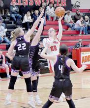 Gracyn Painter puts up two of her 14 points against Burwell.