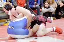 Sam Titus pinned Jett Luft of Gibbon in his first match on his way to fourth place in the 144 lb. weight class.