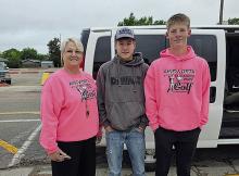 The Ainsworth Boys Golf Team was coached by Julie Micheel this year. This season was Micheel’s final season as head coach. Pictured above is Micheel with state qualifiers Jhett Hollenbeck and Jaxon Rucker.