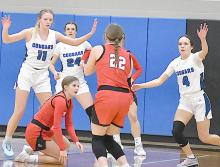 Gracyn Painter shoots the ball from beyond the threepoint line. She had two three-point baskets on the night.