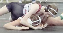 Sydney Hoffman wrestled in the 110 lb. weight class at the NSAA Girls B District 2.
