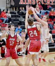 Logan Schroedl drives for the basket against Ord. Schroedl led the Dawgs in scoring with 7 points.