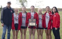 The AHS Girls Cross Country Team qualified as a whole by winning the D-3 District meet hosted at the Ainsworth Municipal Golf Course on Thursday, Ocotber 16. The winning team consists of (left - right): Coach Trey Schlueter, Izzy Painter (38th place), Raegan Moody (second place), Payton Moody (20th place), Kiley Orton (fourth place), Addilyn Doke (33rd place), and Coach Katie Winters.