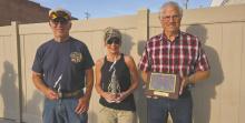The winners of the vehicle division were (left to right): Phil Fuchs, Angie VonHeeder and Joel Ferris.