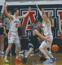 The Ainsworth Bulldogs put up a strong defense along with several steals to go up 29-6 in the first quarter against the Sandhills/Thedford Knights.