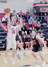 Ainsworth struggled against Broken Bow’s height advantage as shown here with Witten Painter getting the ball knocked away by Broken Bow’s 6’ 2” Drew Ellis.