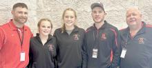 Ainsworth High School State Girls Wrestling Qualifiers, Paisley Hoffman and Megan Jones who will be competing in the 2025 NSAA Girls Wrestling Tournament. Coaches this year are (Left to Right) Ryan Hoffman, Oren Pozehl and Todd Pollock.