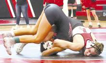 Jolyn Pozehl pinned all three of her opponents in the 110 lb. weight class during the Ainsworth Invitational.