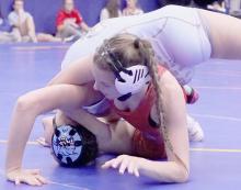 Jolyn Pozehl pinned Ava Cleveland of Summerland to take first place in the 115 lb. weight class at the West Holt Invitational.