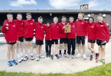 The winning middle school boys cross country team consisted of (left - right): JJ Nelson, Rex Lammers, Leighton Konkoleski, Paul Denny, Adiel Macias-Villalobos, Tygan Sisson, Mason Winters, Blake Hansmeyer, Buck Ruhter, Diego Godoy, and Carter Painter. Photo Courtesy of Katie Winters