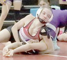 Jolyn Pozhel, wrestling in the 110 lb. weight class, earned her 100th Pin at the Ord Invitational.