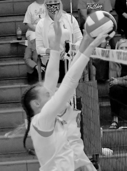 Cameryn Cameryn and Madelyn Goochey go up for a block against the West Holt Lady Huskies. Ainsworth hosted a Dual with West Holt on September 14th.
