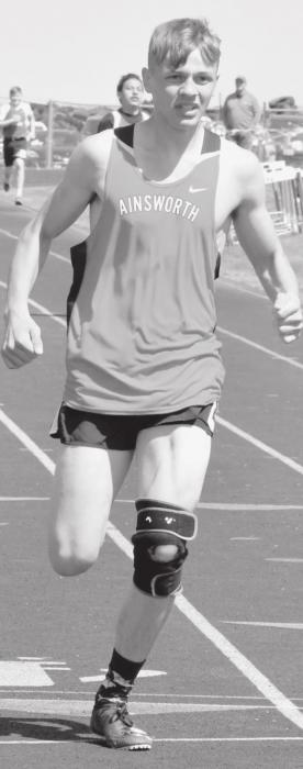 Owen Blumenstock wins the Jr. High Boys 400 Meter Dash. He also won the Boys Jr. High Triple Jump with a distance of 33’ 10’’.
