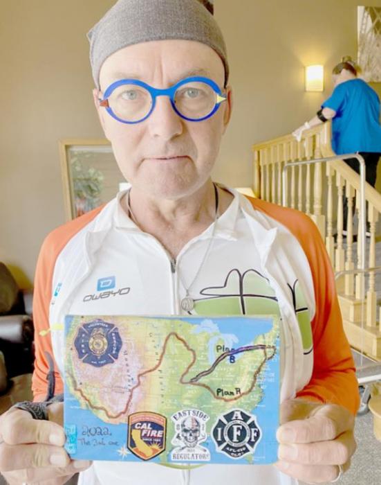 The map Richter is holding shows the path he will be riding his bicycle on from San Francisco to New York.