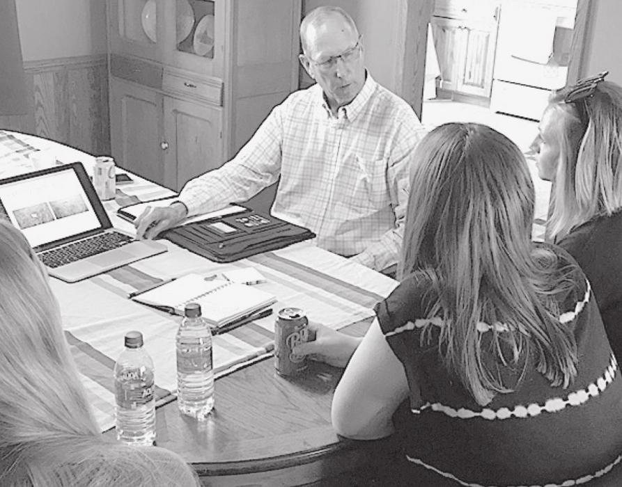 Homer Buell visits with members of the KBR Leadership Academy in a breakout session last week during their Natural Resources session. Photo by Leah Hagan