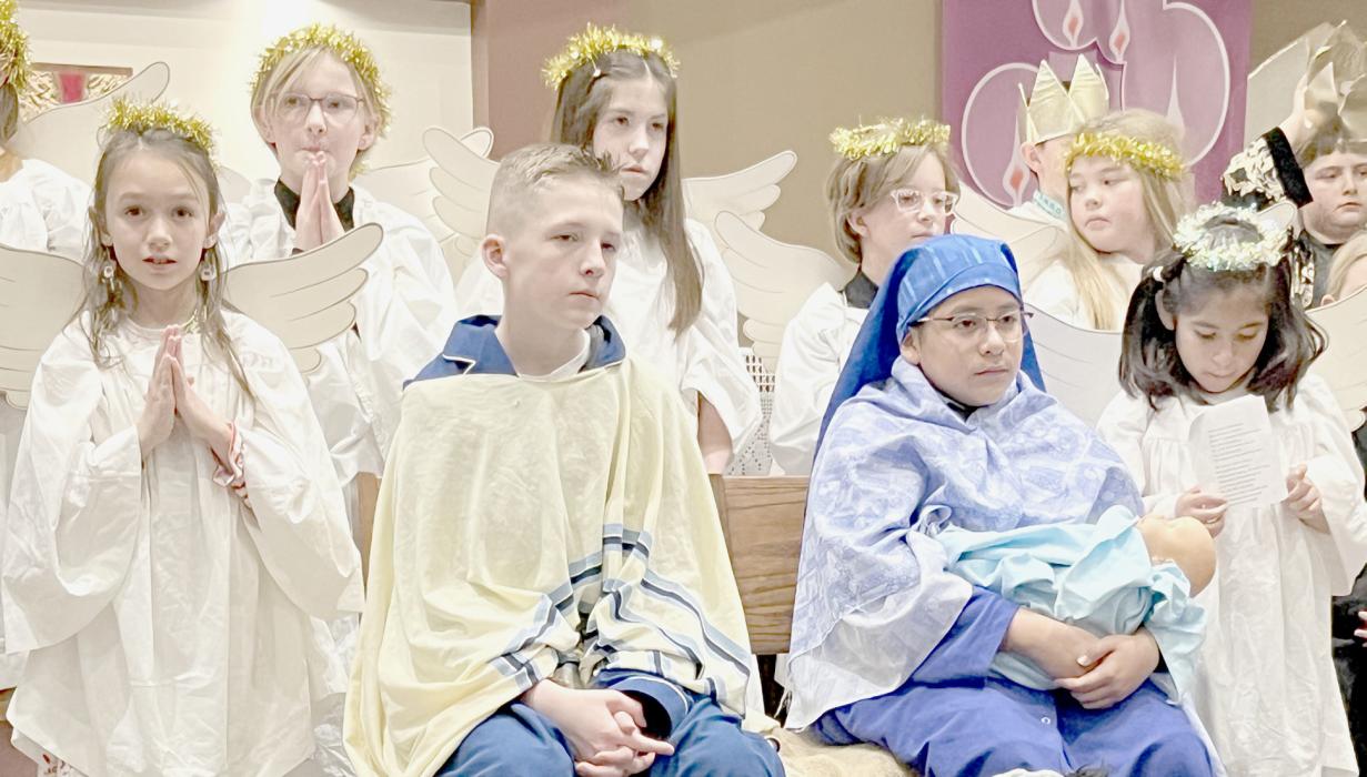 The Holy Family (left to right) angel Cece Kerrigan, Rex Lammers, Julieta Carranza and angel Brenda Carranza.