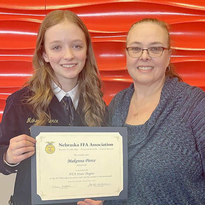 Makenna Pierce (left) received her State FFA Degree and was selected as a member of the State FFA Choir. She is pictured with her mother, Dawn Pierce.
