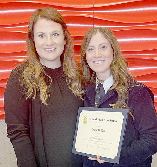 Tatum Nickless, (right) who received her Nebraska State FFA Degree is pictured with Ainsworth FFA Advisor Emily Whipple (left).