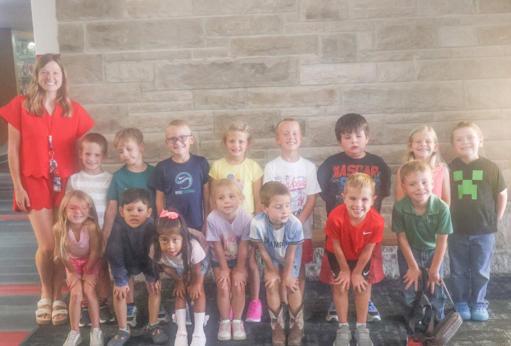 Mrs. Elizabeth Arens' 2026 kindergarten class includes back row (left - right): Elizabeth Arens, Bergan Arens, Micah Carpenter, Henry Dinklage, Daityn Dailey, Brooks Wasmund, Grayson Magill, Brinley Ganser and Justus Schenk. Front row: Gia Martin, Noe Gutierrez, Leah Sanchez, Oakley Pozehl, Nash Cozad, Jameson Fairhead and Bentley Davis.