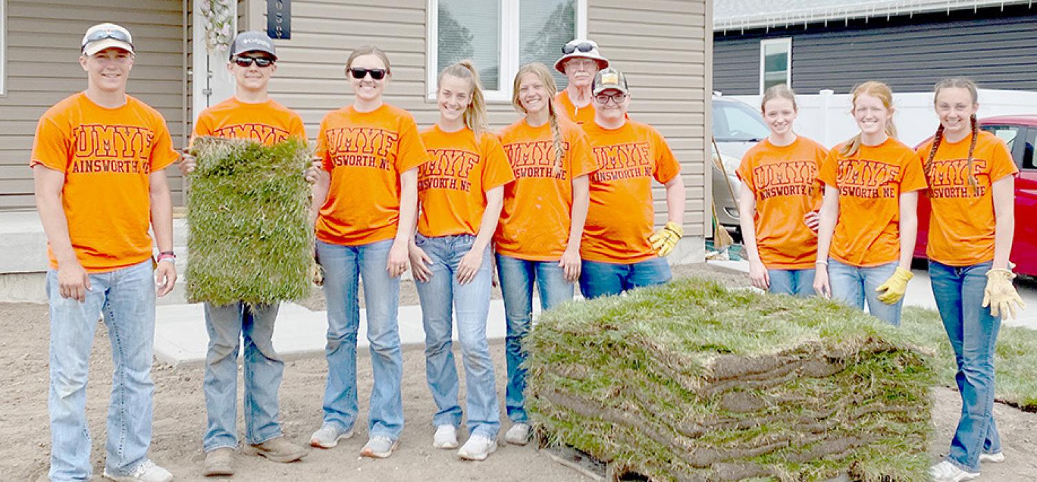 One of the projects the UMYF helped with was laying sod at two houses.
