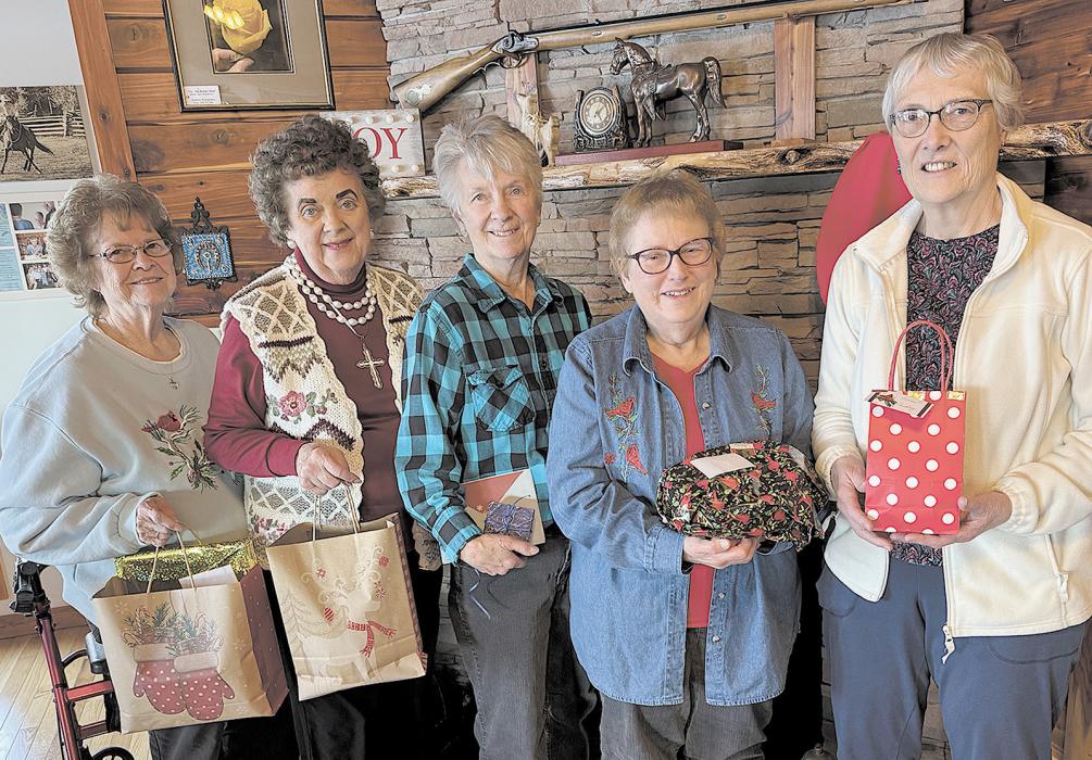 Present for the Annual Meeting and Christmas Party were (Left to Right) Audrey Wilson, Patty Nelson, Lynn Robertson, Carol Woods and Martha Rasmussen.