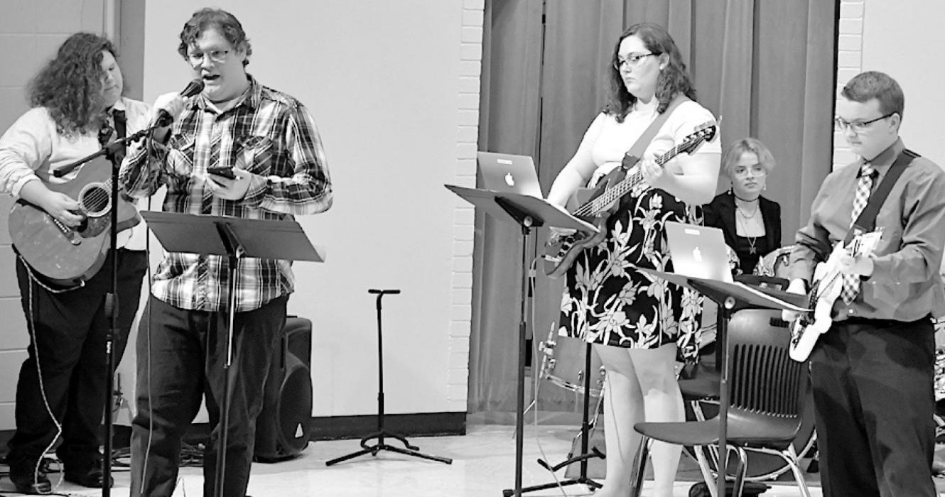 The 520 Band entertained the audience with two songs during the awards ceremony. The first song, “(The) Blues” by Johnny Cash was sung by Seth Anderson and the second tune, “Holiday” by Greenday was sung by Matt Jeffers.