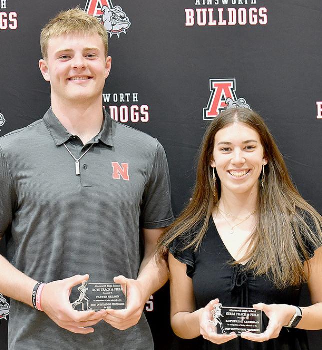 Carter Nelson (left) and Katherine Kerrigan (right) were named the Boys and Girls Most Valuable Players for the 2023 Track Season.