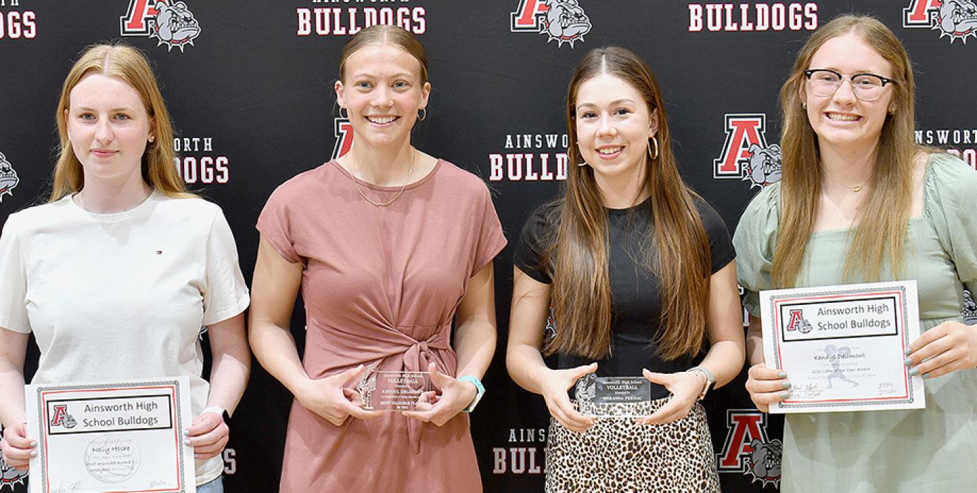 Coach Geri Graff presented awards to (left to right) Nelly Hoche - Most Improved Player, Kendyl Delimont - Most Valuable Player, Breanna Fernau - Heart Award and Gracyn Painter - Hustle Award.