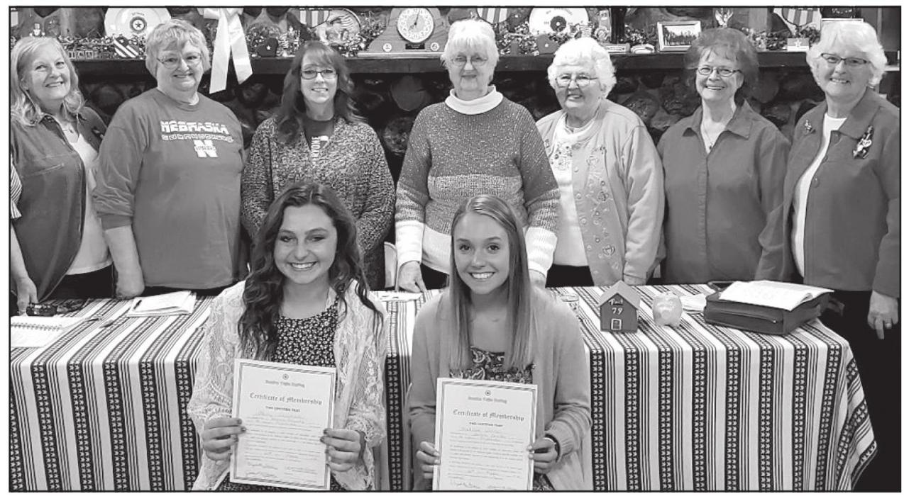 New graduates Molly Salzman and Madison Welch were promoted to Senior Auxiliary members on March 23rd. Not pictured were Aliya Keezer and Josie Ganser. They are surrounded by Ainsworth American Legion Auxiliary members (left to right) Janet Schuyler, Marilyn Anderson, Cheri Coutts, Alice Mitchell, Sunny Kyser, Audrey Wilson and Shari Luther.