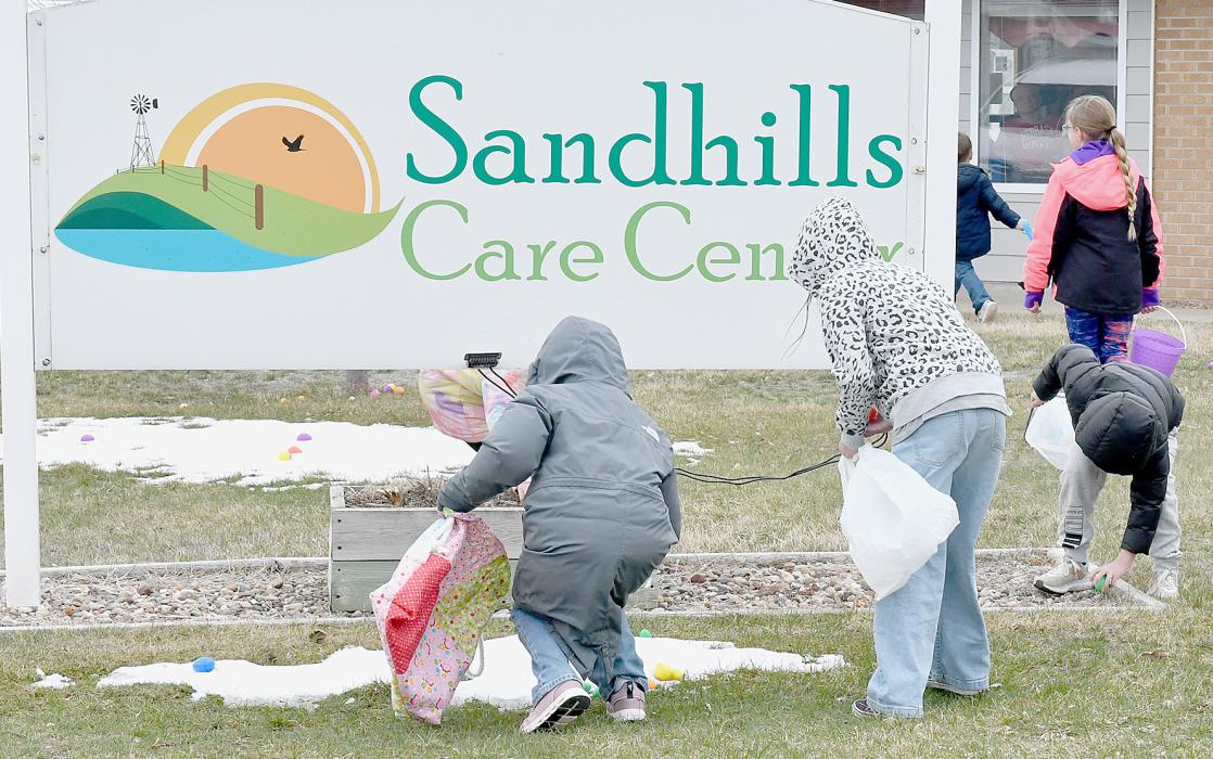 Helping with preparations for the Sandhills Care Center’s Easter Egg Hunt on Friday, March 29th, residents of the center helped fill plastic Easter eggs with candy. When the residents were done, 538 eggs were filled with candy and ready to be hidden outside. The temperature was 41˚ with wind gusts of 21 mph. Although the temperature wasn’t the warmest, the youth had fun hunting for the eggs to find out what was inside.