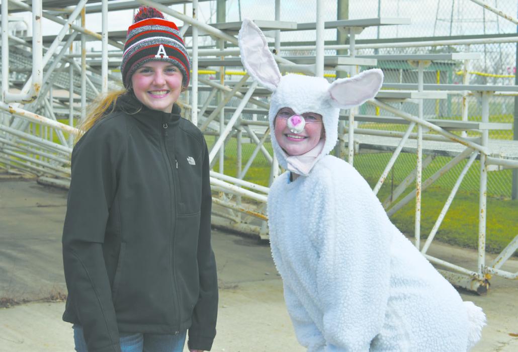 Ainsworth American Legion Junior Auxiliary members Gracyn Sisson (left) and Payton Moody (right) helped organize the egg hunt hosted by the Ainsworth American Legion.