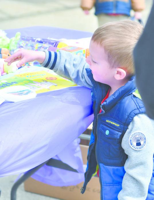 Attendees chose prizes from the table if their name was drawn at the Legion’s egg hunt.