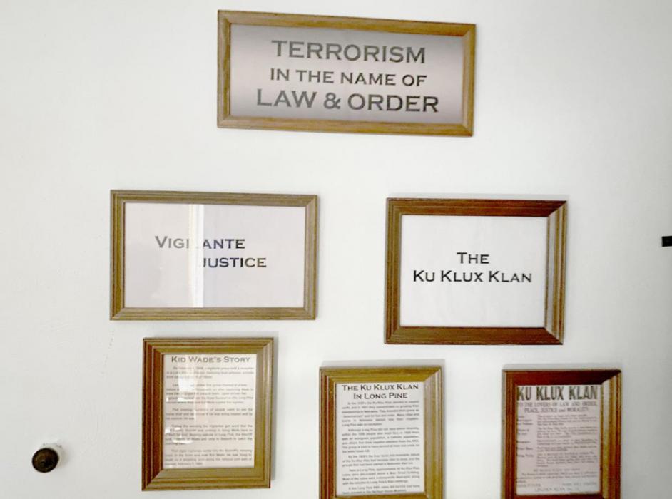This wall in the Outlaw Room showed information about Kid Wade and the Ku Klux Klan.