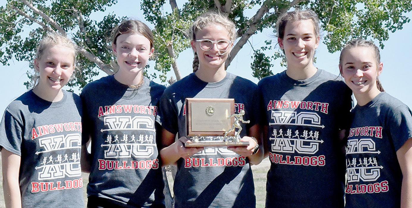 Ainsworth Cross Country Team of (left to right) Preselyn Goochey, Payton Moody, Emma Kennedy, Katherine Kerrigan and Tessa Barthel took first place at the Ainsworth Cross Country Invitational.