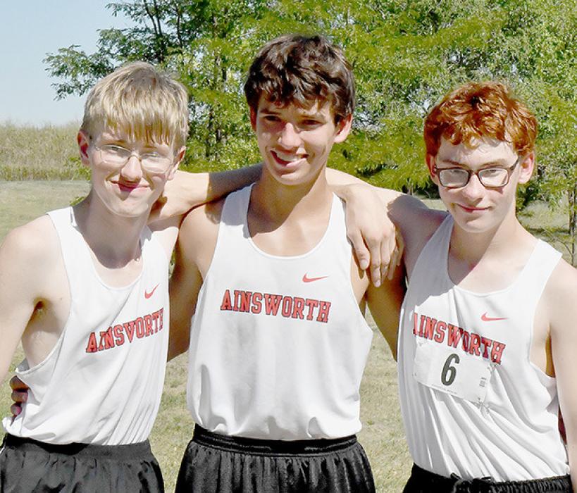 Ainsworth Boys Cross Country Team are (left to right) Levi Goshorn, Corbin Swanson and William Biltoft.