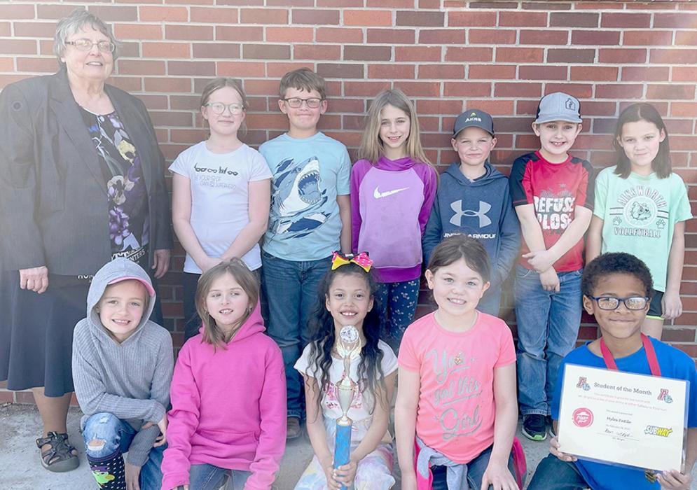 The February Class of the Month was Miss Peterson’s second grade class. The second graders pictured are (Front Row - Left to Right): Elsie Graff, Logan Johnson, Juliette Navarro, Taylor Kelley and Myles Fatile; (Back Row - Left to Right): Miss Peterson, Faith Haley, Jonathon Cannaday Jr., MaKayla Keller, Jerrod Buechle, Ty Ruhter and MacKynzi Swett. Not pictured are Daniel Lewis and Sophia Schroedl.