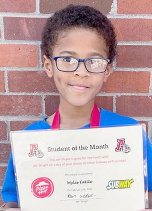 Second grader Myles Fatile (right) was selected as the February Student of the Month at McAndrew Elementary.